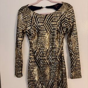 Black and gold sequin dress